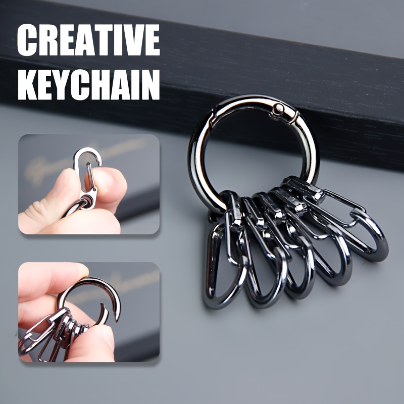 

Sleek And Stylish Keychain With Creative Minimalist Design, Featuring A Black Circular Ring And A Spring-loaded Hook