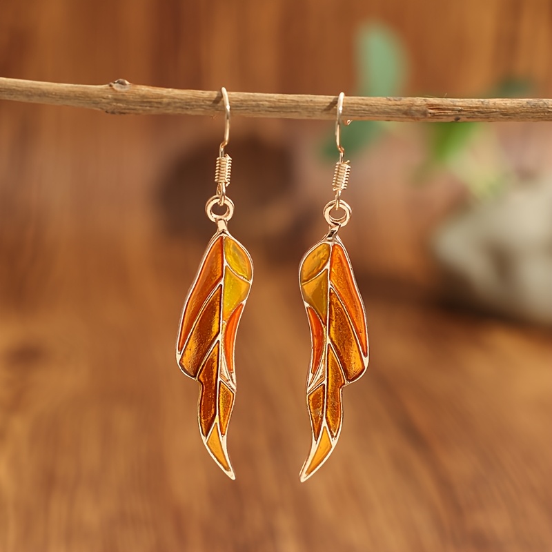 A Pair Of Fashionable Leaf-shaped Epoxy Beautiful Long Alloy Earrings