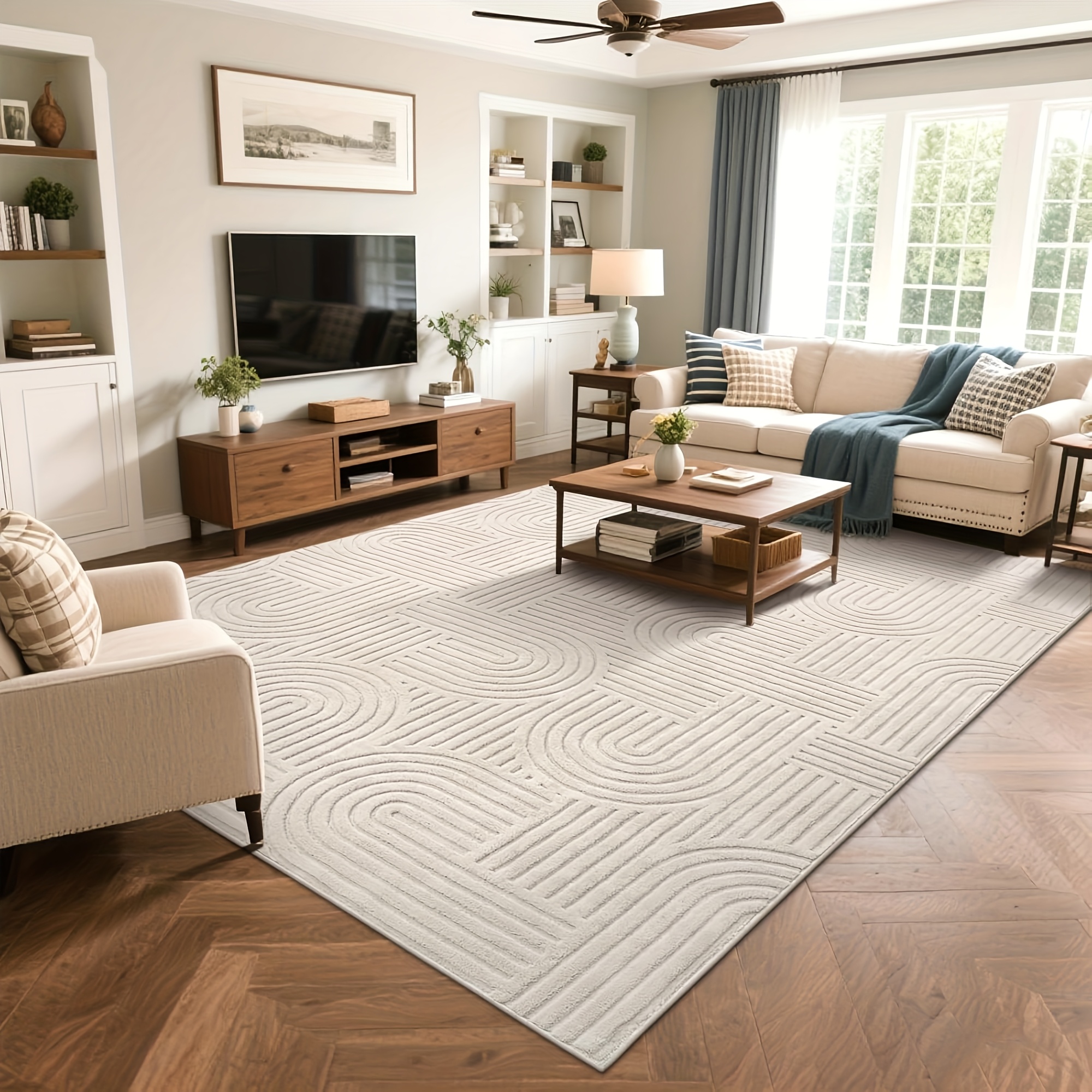 beige area rug with a soft cozy and fluffy arch pattern featuring a high low pile texture this modern geometric carpet is non slip and washable making it   the living room bedroom or dining room