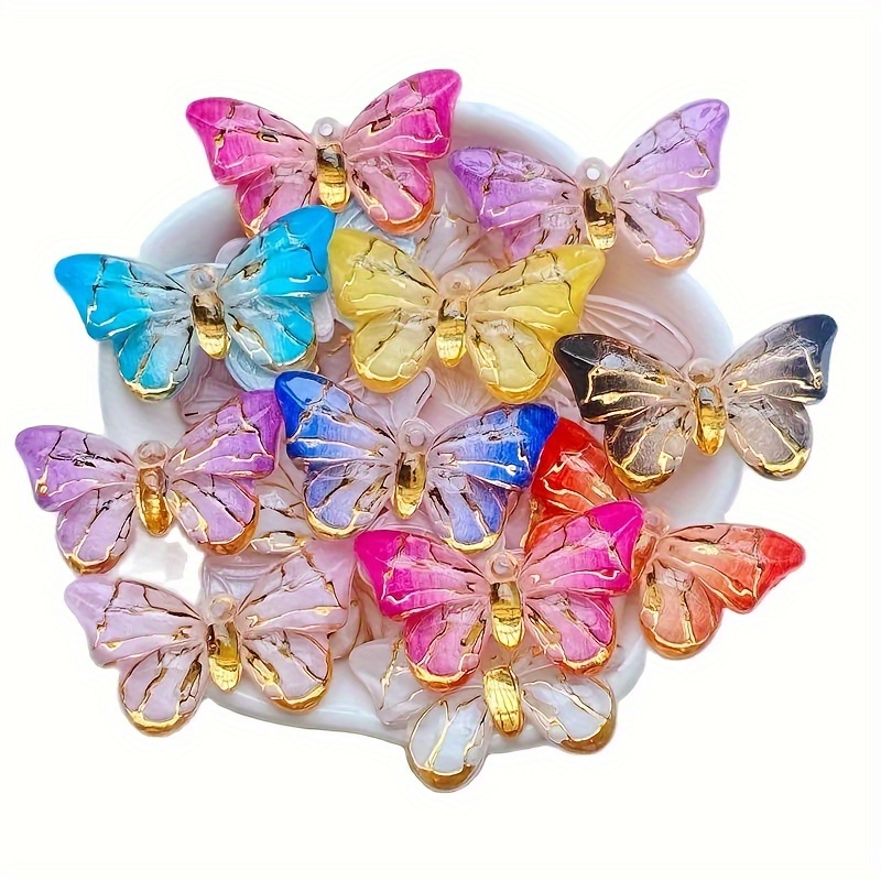 

Lot de 12 Perles en Résine Papillon Cristal Colorées, Pendentifs en Strass à Dos Plat avec Trou Unique pour Bijoux DIY et Décorations Artisanales