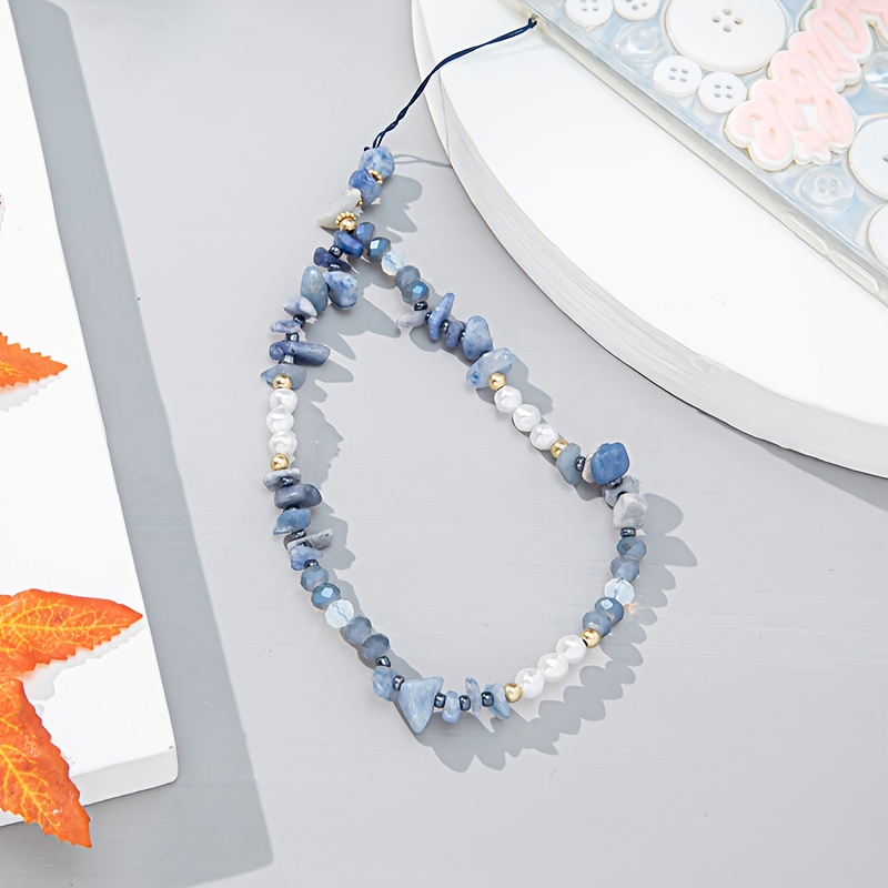 Image of A Handmade Mobile Phone Chain Made Of Crushed Stone Resembling Pearls, Suitable For Hanging On Phones, Bags, Or Keys, And A Unique Sense Of Luxury To