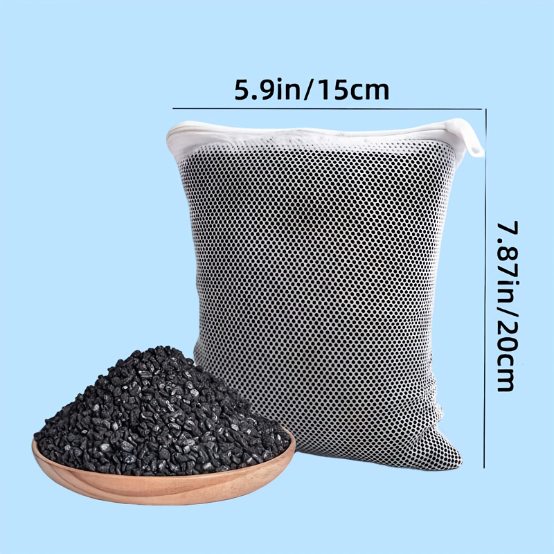 Image of Coconut Shell Activated Carbon For Aquariums, Packed In A Mesh Filter Bag, Used For Purifying Water Quality In Fish Tanks, Pond Filtration, And Odor Absorption