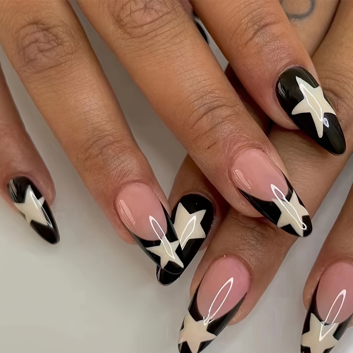 

24 Pcs Long Almond Black French Manicure With Star Design Artificial Nails Set, Jelly Glue & Nail File Included