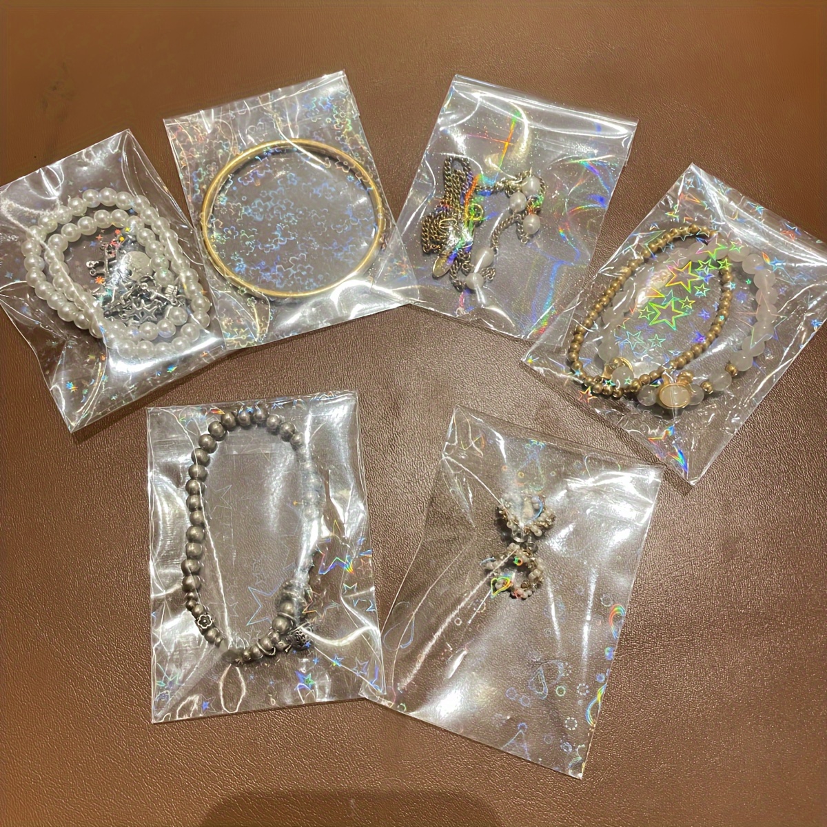 50 Transparent Laser Jewelry Pouches, Glitter Storage Bags