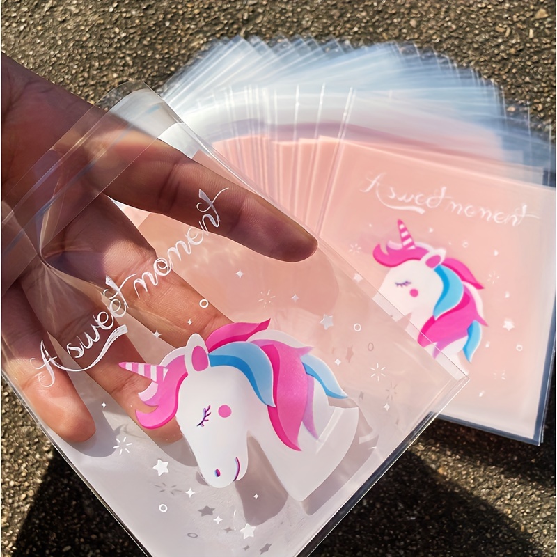 

100pcs Cartoon Unicorn, Swan, & Cat Clear Candy Bags, Transparent Plastic Cookie Pouches For Birthday Party, Gift Packing, Festive Treats Storage