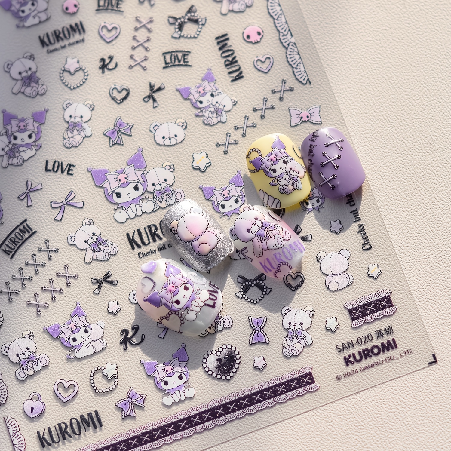 

Autocollants pour ongles Sanrio Kuromi - de dessin avec nœud et cœur, nouveaux autocollants décoratifs pour ongles.