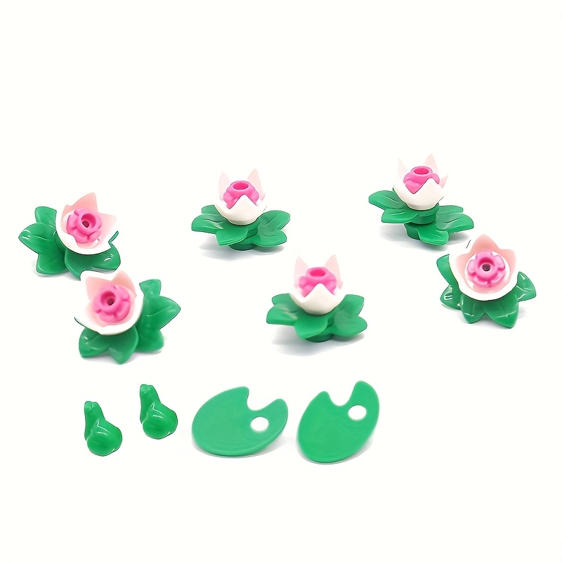 Image of Components For Pond Construction Featuring Decorative Lotus, Frog, Squirrel, And Mushroom Pieces, With Part Numbers 11568, 12992, 4740, And 59900 For A Forest Scene