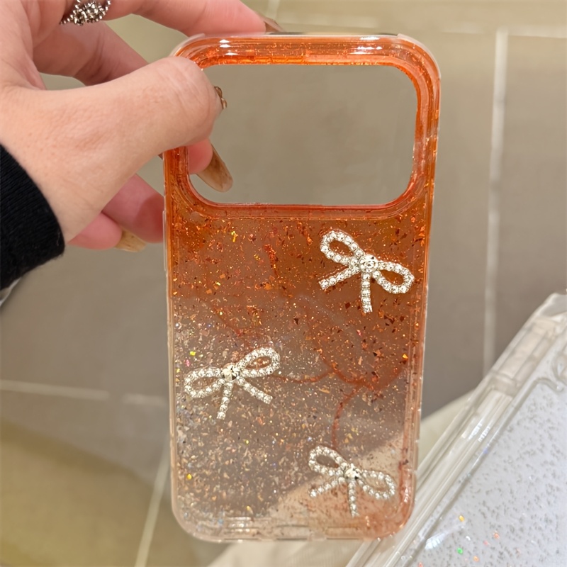 TEMU Coque de téléphone - Coque de téléphone tendance avec un nœud de strass brillant et luxueux dans un dégradé orange, conçue pour divers modèles
