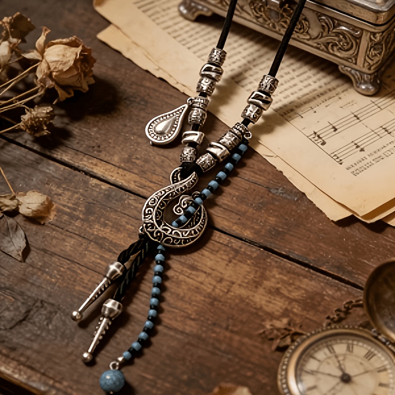 Retro Distressed Silvery Snake-shaped Rope Necklace, Teardrop Tassel Ethnic Style Vacation Outfit Niche Accessory: retailer-supplied image