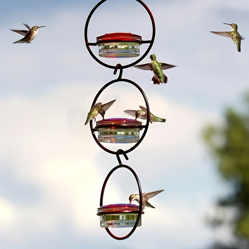 

Elegant 3-tier Hanging With Red-capped Glass Bottles - Metal Frame, Ideal For Garden, Patio, Backyard & Deck Bird Watching, Hummingbird Feeders Outdoors