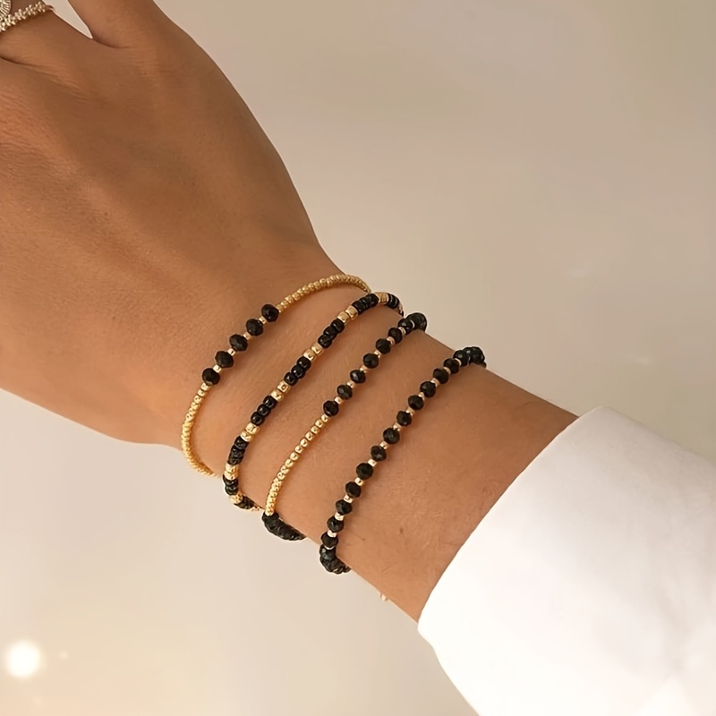 

Elegant Lady's Black And Golden Beaded Bracelet Set: Perfect For Parties And Festivals - No Plating, No Setting, Just Pure Beads