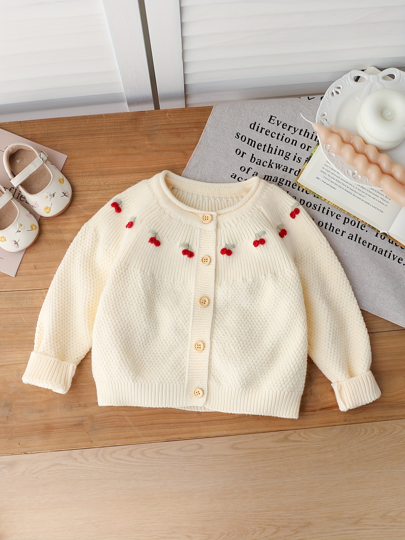 baby cardigan sold on Temu United States