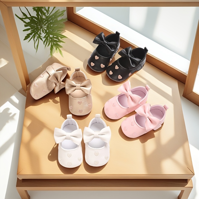 b1246412-3b54-4fe5-9312-e66e5bf776e0.jpg Gentle, Adorable Heart-Embellished Soft Sole Mary Jane Shoes for Baby Girls - Perfect for First Walkers, Spring & Autumn