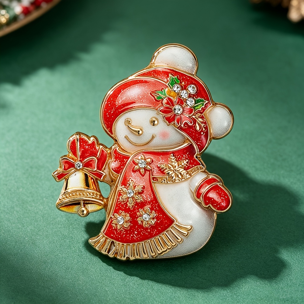TEMU 1 pièce Broche strass de neige avec clochette, pompon et écharpe multicolores, motif de neige en émail, épingle pour pull, accessoire de tenue