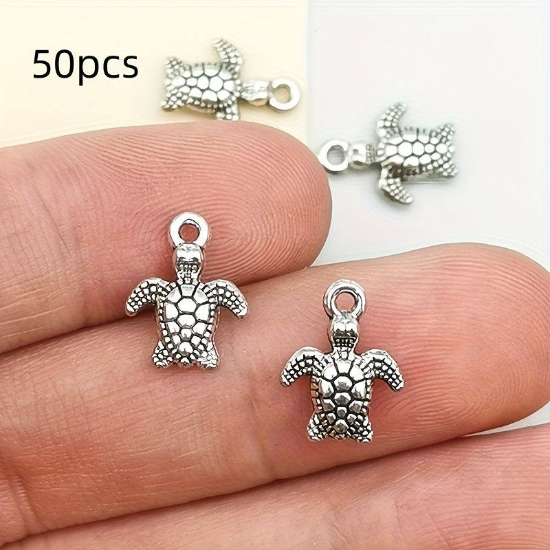 E-shop Set mit 50 Schildkröten-Charms zum Gestalten von stylischem Schmuck, inklusive Zubehör für Armbänder, Halsketten und Ohrringe