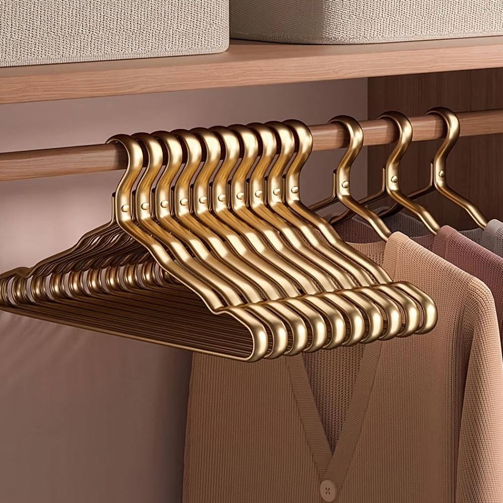 

[customer ] 10pcs Elegant Lacquered Metal Hangers - Non-slip, Traceless Design For Home & Shop Organization