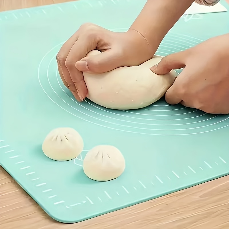 1 thickened kitchen kneading mat measuring 19 7 x 15 7 inches made of non stick silicone material its non slip surface   it ideal for tabletop baking as well as for preparing pizza and cake dough in restaurants