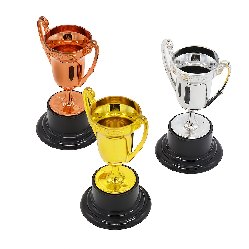 1pc/3pcs Mini Plastic Golden Trophy, Desktop Ornament, Sports Champion Reward Trophy, Mini Decorative Accessory,the Perfect Gift for Weddings, Birthdays, Valentine's Day, and Easter Holidays.Open in new tab.