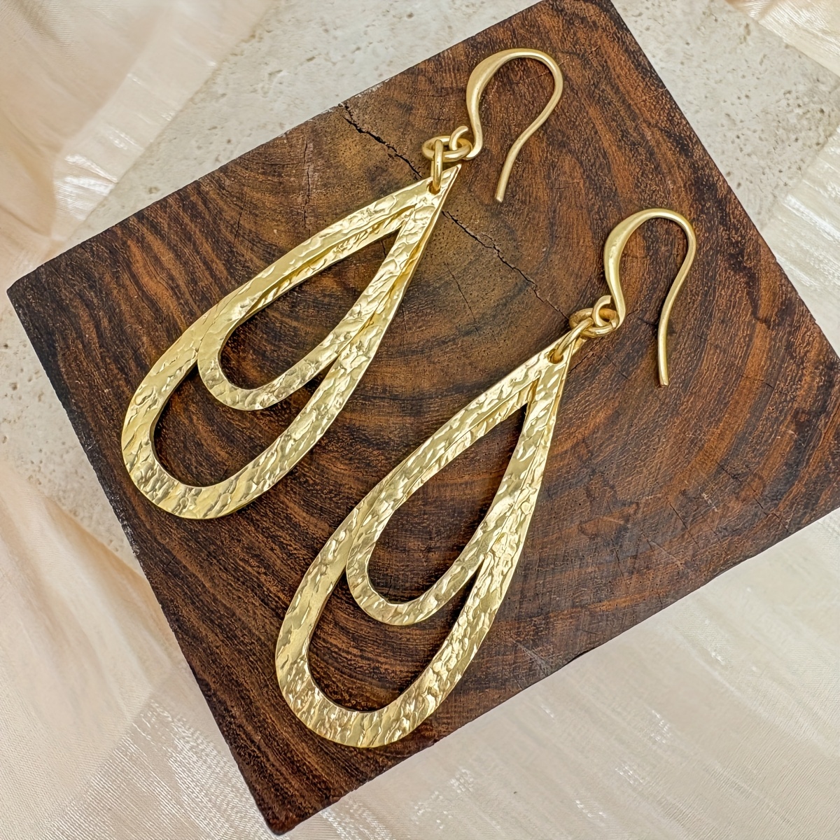 Image of A Pair Of Earrings With Layered Teardrop Shapes, Featuring A Minimalist , Natural Texture, Versatile Style, And A Unique Personality. Perfect As A Party Gift Or Exquisite Valentine's Day Present