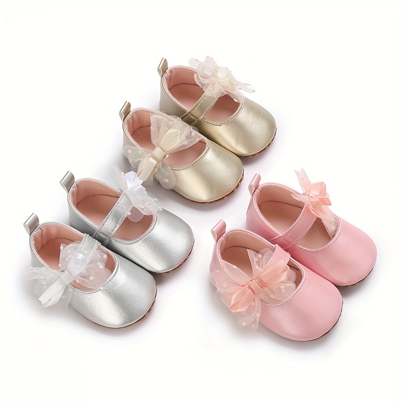 b255689e-0ffc-4526-8f60-3c480a50937e.jpg Soft-Soled Non-Slip Princess Shoes for Baby Girls with Bow, Perfect for Spring And Autumn.