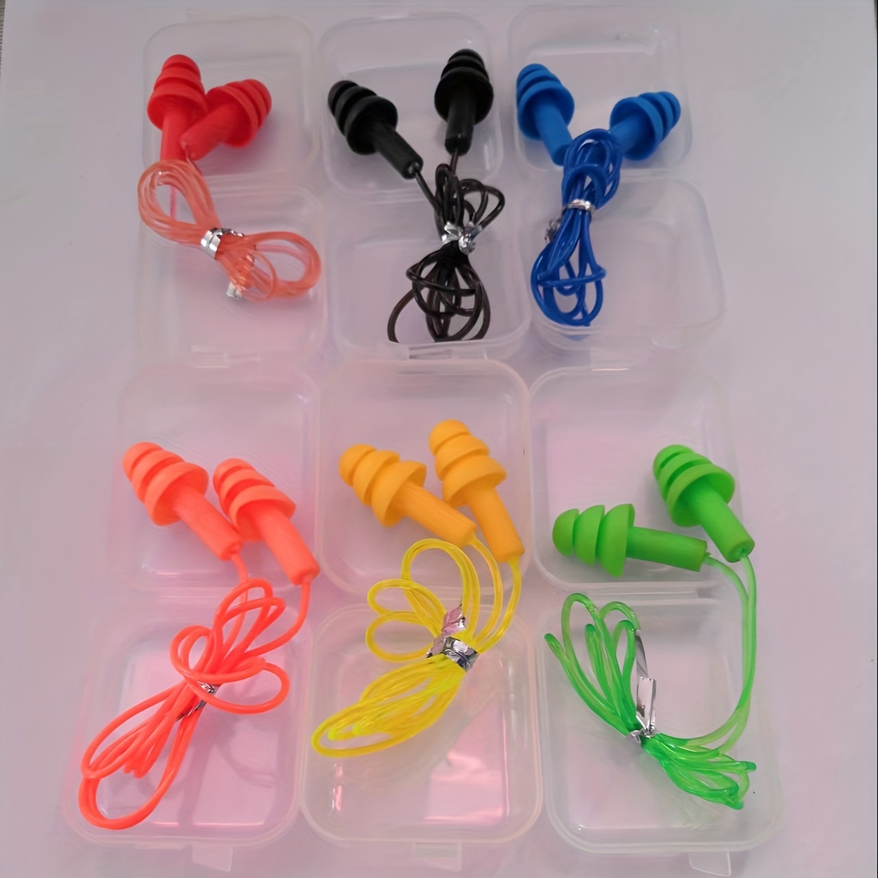 

Lot de 6 Bouchons d'Oreilles de Natation en Silicone Réutilisables en Mélangées avec Corde en PVC , Étanches & Confortables pour Hommes et Femmes - Inclut un Étui de Rangement