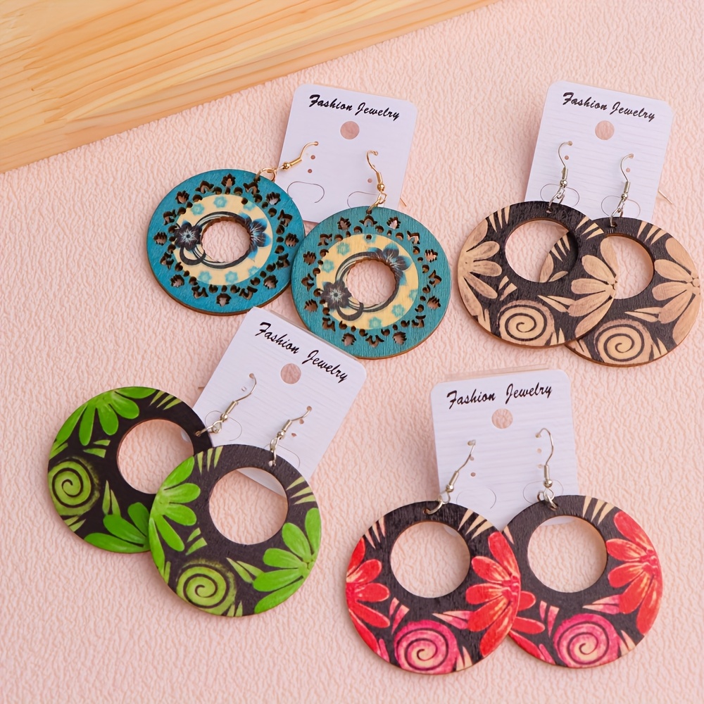 9 orecchini bohemien retrò etnici in legno donna motivi - Italy