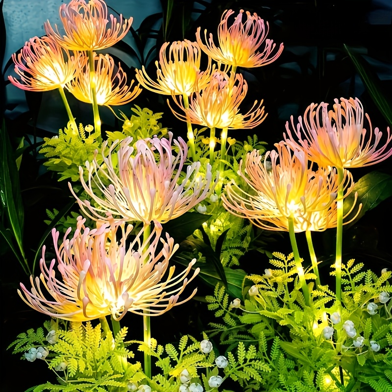 E-shop Diese solarbetriebene an Blumenlaterne beinhaltet leuchtende Blumen und Stiele, die Solarenergie . Sie dient als Outdoor-Beleuchtungsoption für