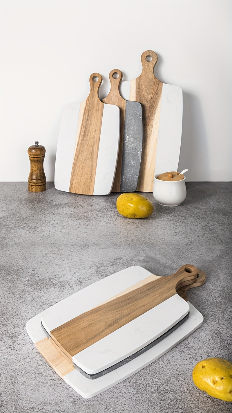 marble and wooden chopping board with handle   slicing bread vegetables and fruits kitchen essentials details 0