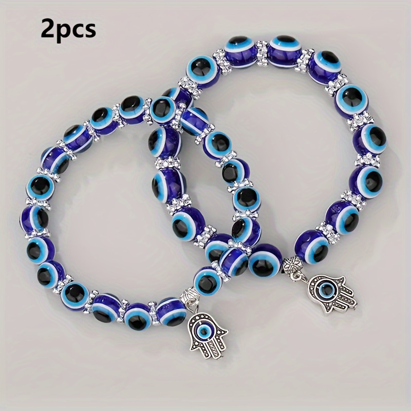 

2 bracelets bohèmes en résine des perles bleues représentant le œil et un pendentif élastique en de de , de la et la bénédiction, polyvalents toutes les .