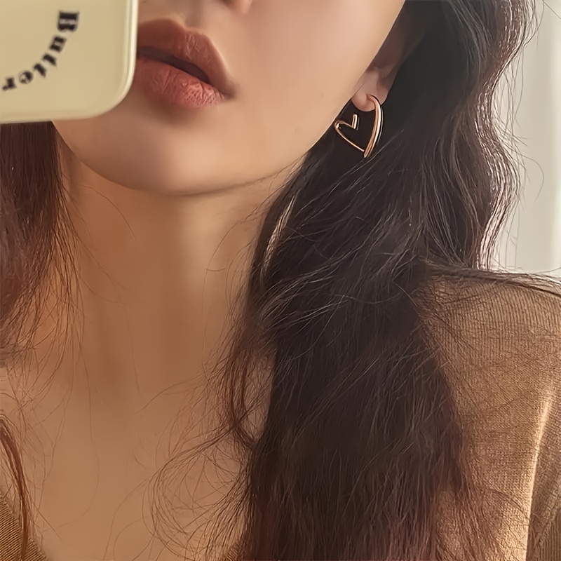1 pair elegant 18k golden plated hollow heart shaped hoop earrings for women cute 304 stainless steel hypoallergenic non fading versatile for daily wear christmas gift Product details 5
