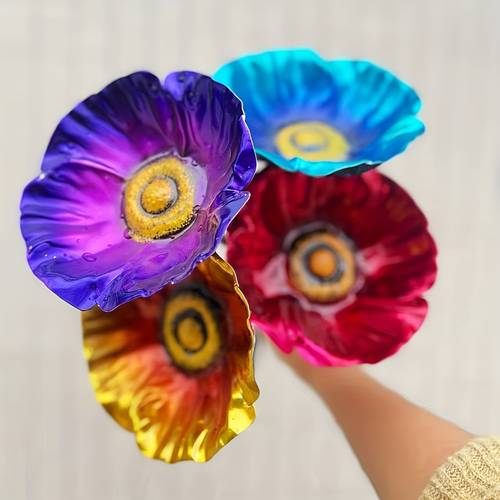 3 wrought iron poppy flower stake injects and into rust proof metal material is covered with weather resistant and bright paint red orange blue