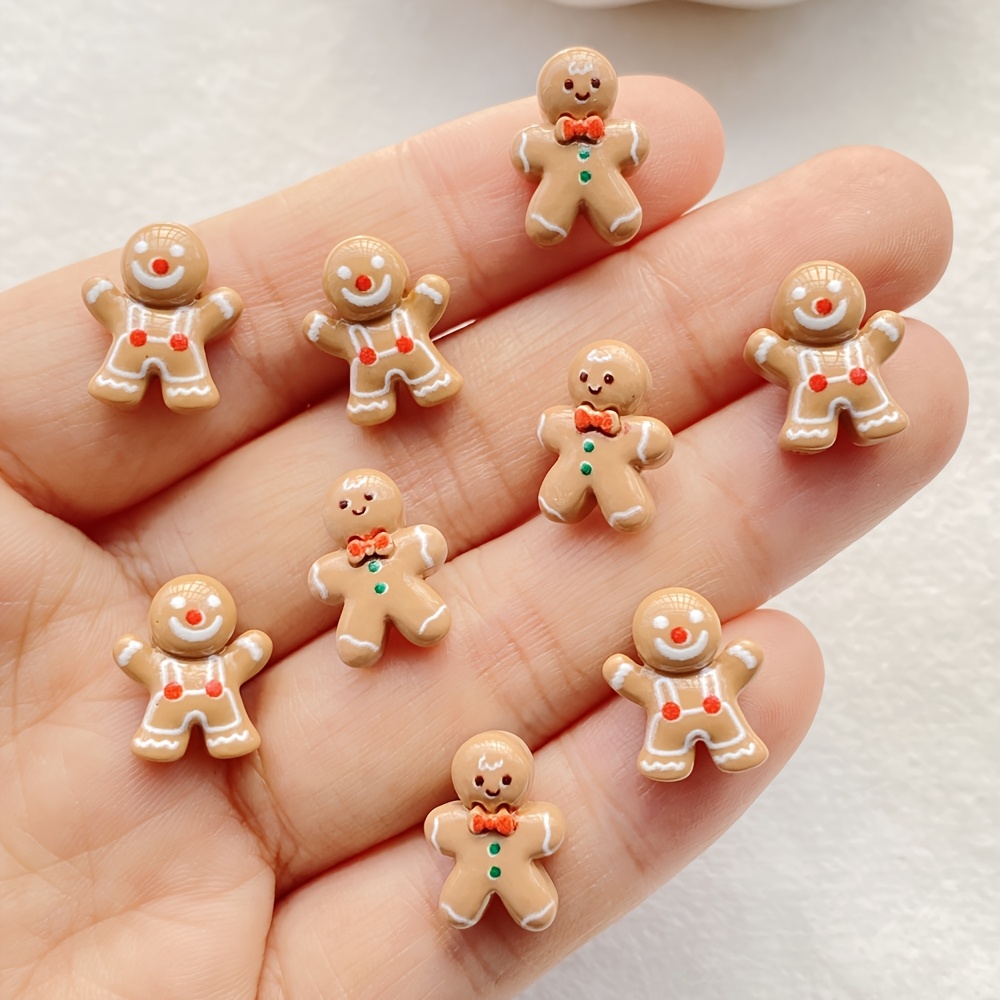 

12pcs Christmas Gingerbread Man Miniature Resin Figurines, 3d Flat Back Cartoon Cookie People Embellishments, For Diy Scrapbooking, Nail Art, Jewelry Making, And Holiday Craft Decorations