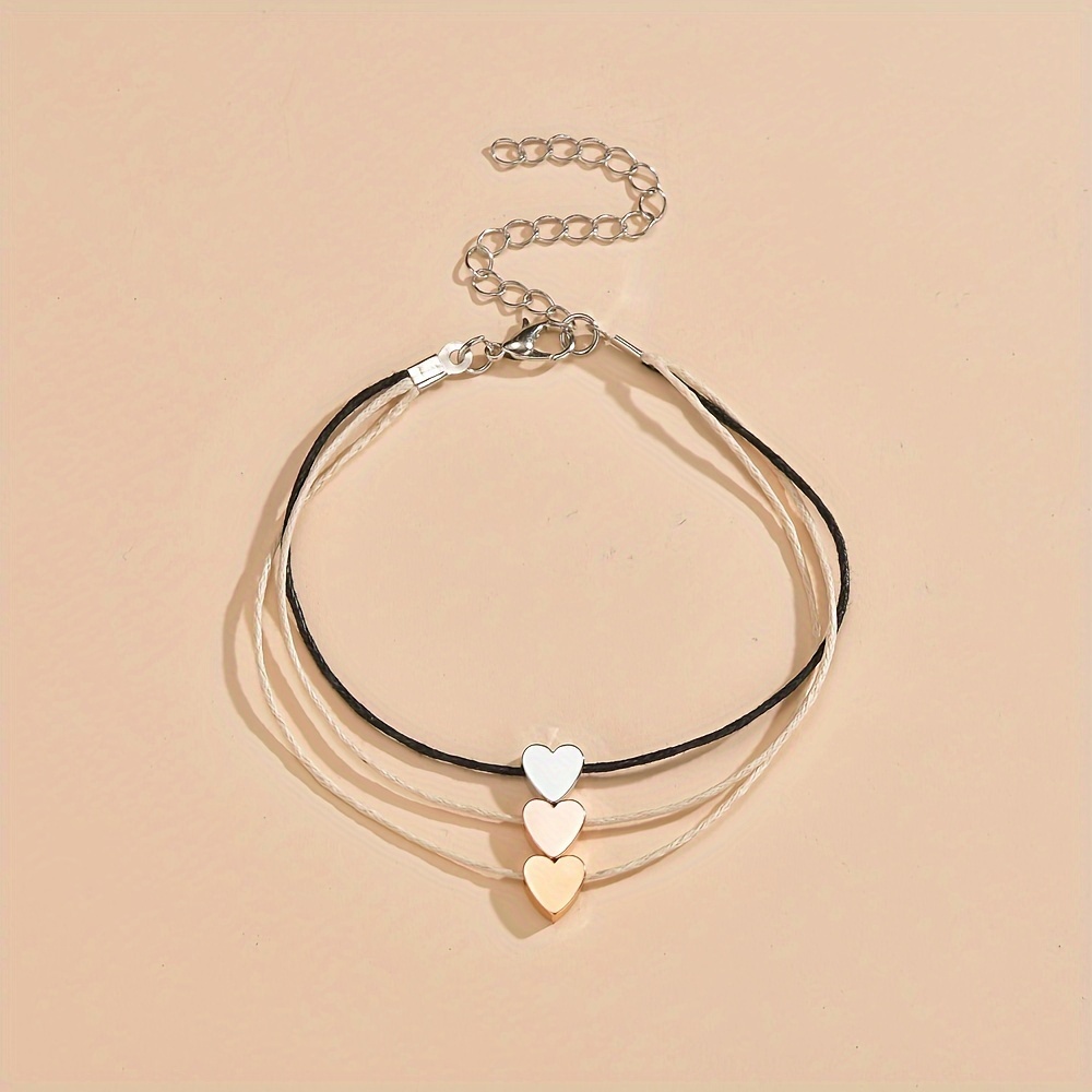 Bracelet de cheville en acier doré avec charms cœur croix
