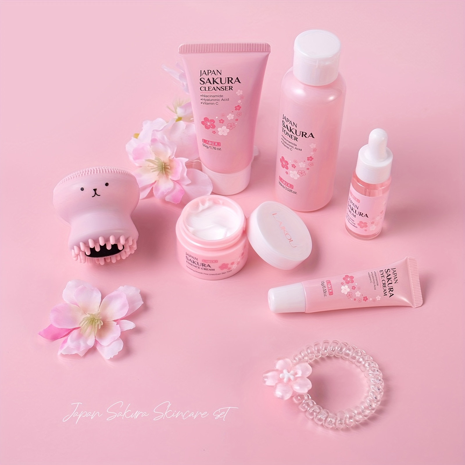 LAIKOU Sakura Poklon Kutija 7-dijelni Set za Njegu Kože, Niacinamid za Posvjetljivanje Protiv Otpadanja, Serum, Krema za Hidrataciju Lica, Krema za Oči, Tonik, Blago Čišćenje Lica, s Četkom za Kosu i Gumicom za Kosu, Rođendanski i Božićni Pokloni