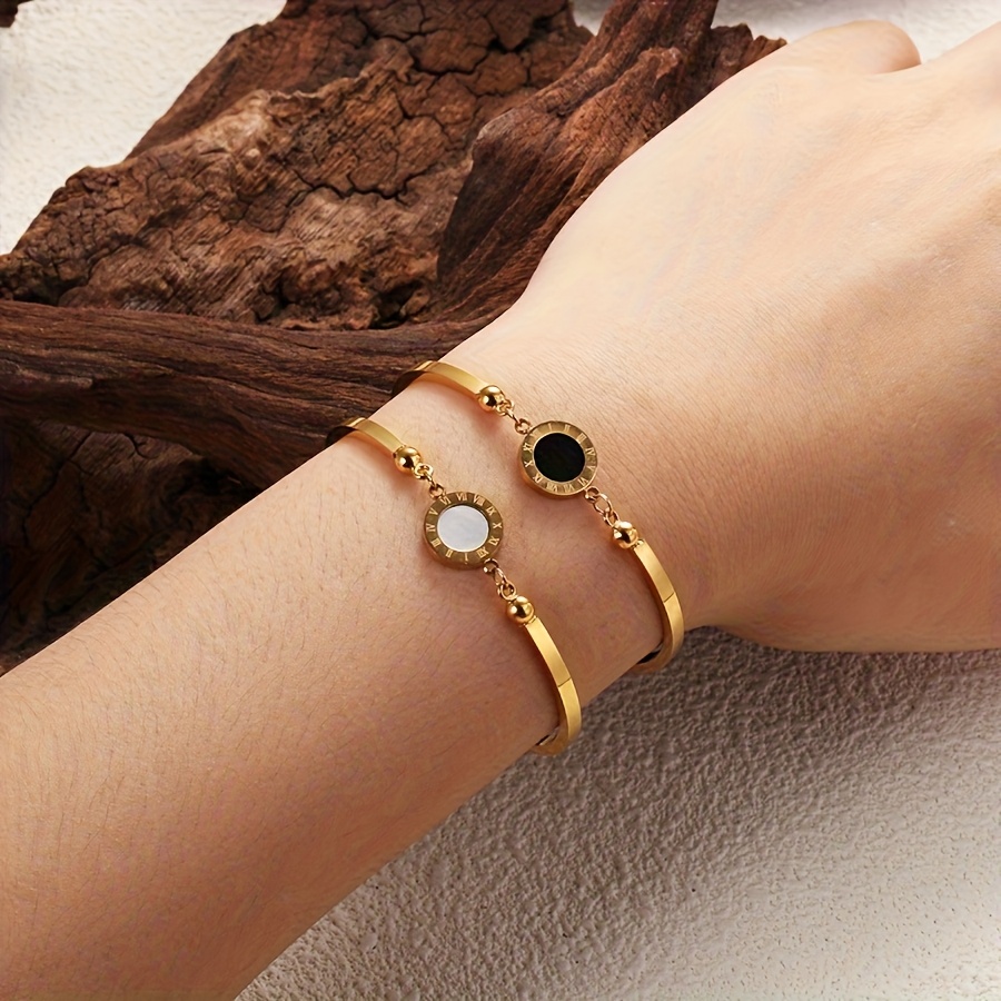 A Roman Numeral Bracelet Available in Four Colors: Black, White, Red, And Green. Made of Stainless Steel, This Classic And Stylish Jewelry Piece Is Designed for Women