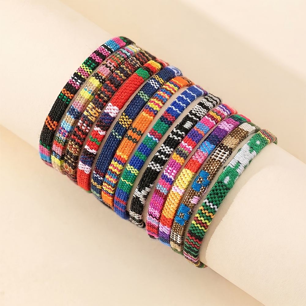 Juego de 12 pulseras de amistad ajustables tejidas a mano estilo bohemio, ideales para fiestas y ocasiones diarias de…: retailer-supplied image