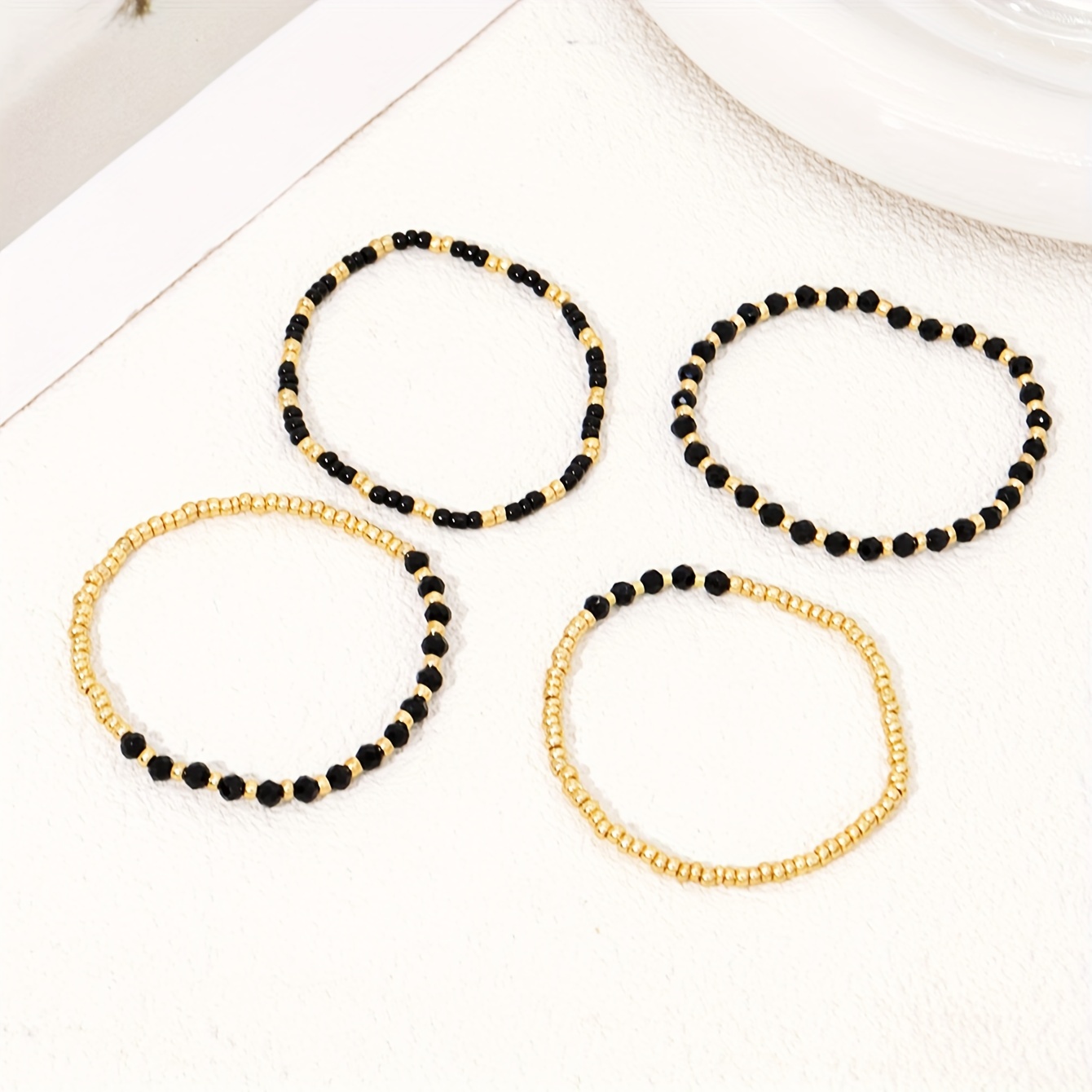 E-shop 4-teiliges Mode-Armband-Set, elegantes Damen-Set mit schwarzen goldenen Reisperlen, Schmuck-Ergänzungen für und Partys
