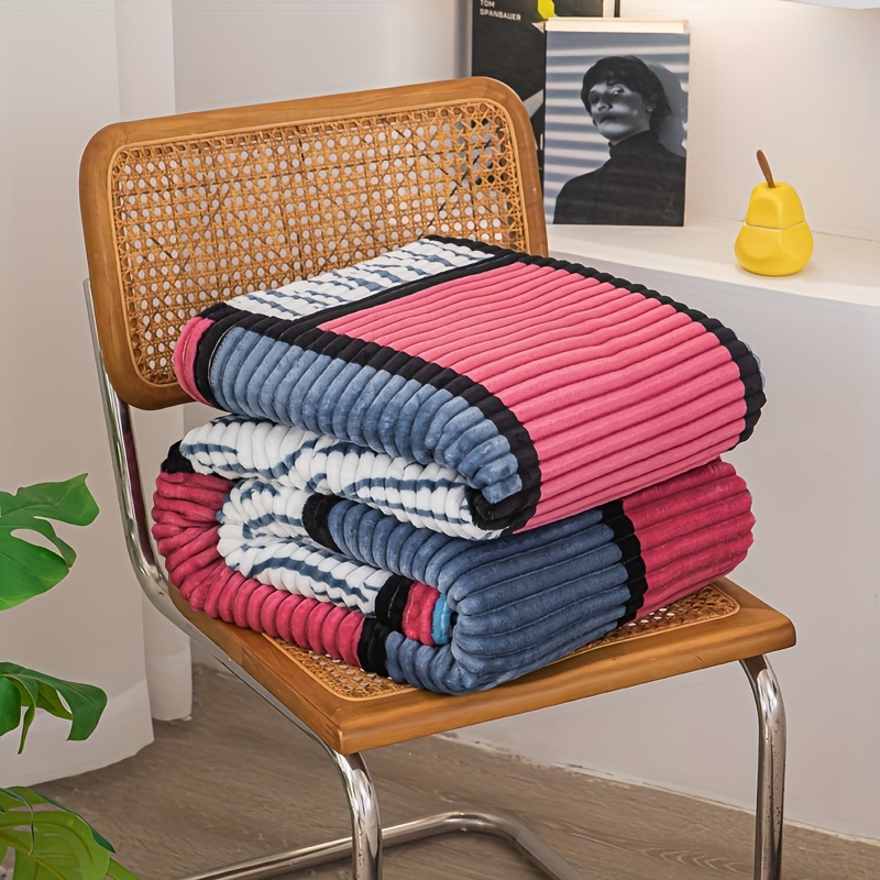 a magical fluffy striped blanket with printed   made of fleece   the office or a nap details 17