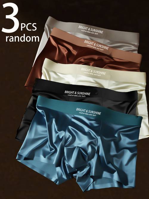 3pcs of assorted mens boxer shorts made from smooth and lightweight fabric featuring cool and breathable ice silky fiber fabric a trendy solid color summer bestseller