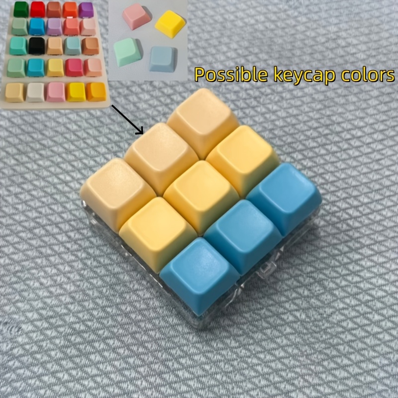 TEMU Macaron-colored Nine-keycap Large-base Stress-relief Keychain, A Keyboard Stress-relief Clicker, A Student Decompression Tool. An Essential