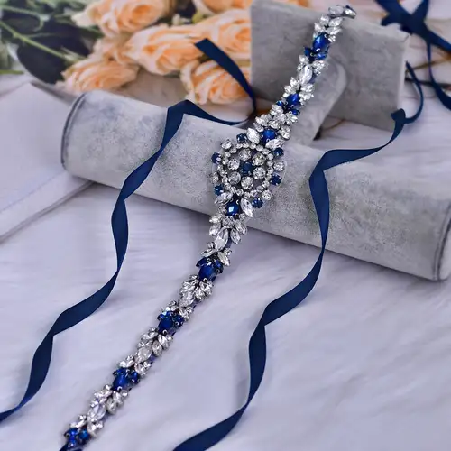 elegant navy blue dress accessories Shop our lovely navy blue gown, paired with our stunning gold clutch and accessories !! #style #laredoboutique #fashionista #explorepage