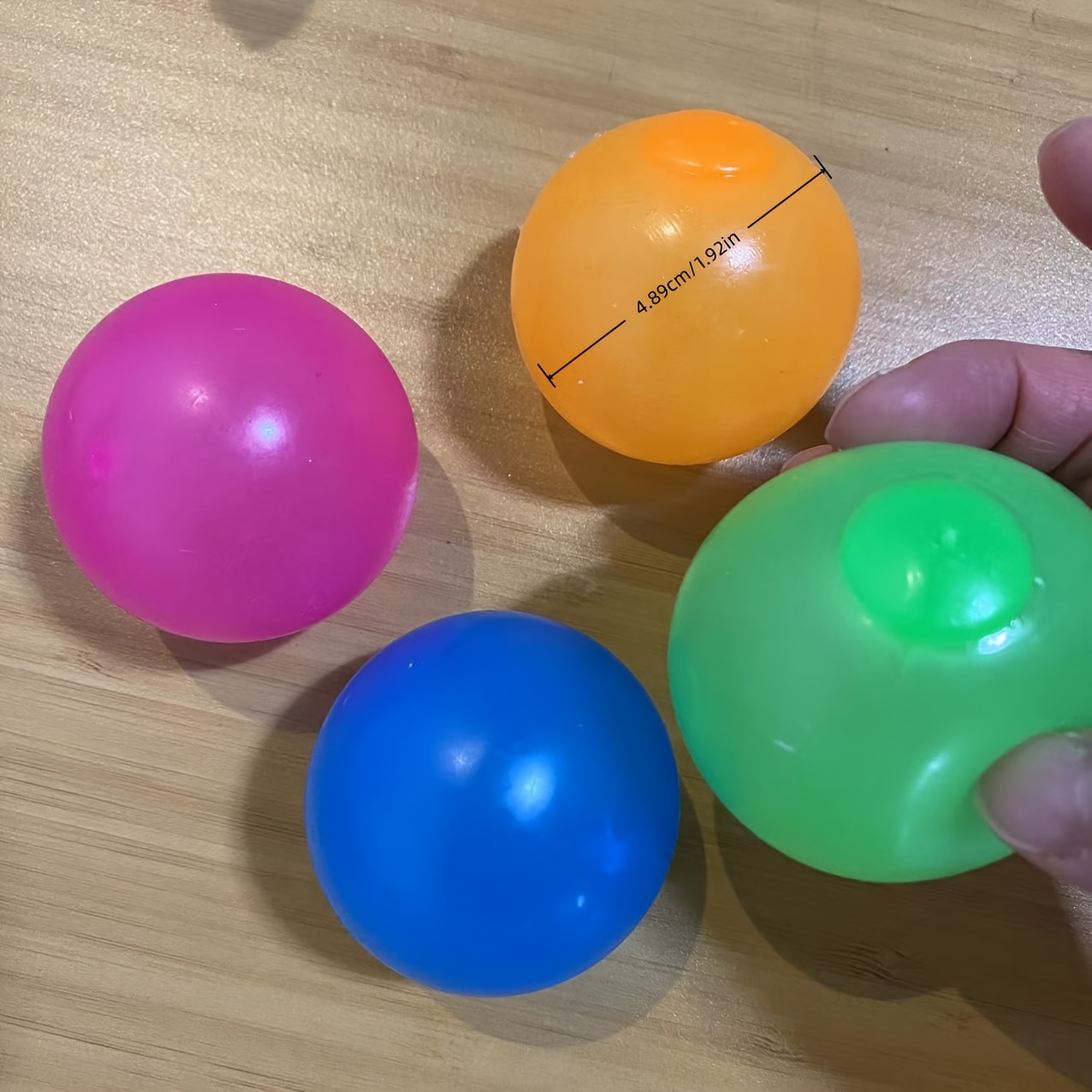 Image of 4pcs Glowing Sticky Balls, Stress Ball, Glow In The Dark Toys Stick To The Wall, Squeeze Toys For Kids For Birthday Gift, Party Favors & Prizes Random Colors