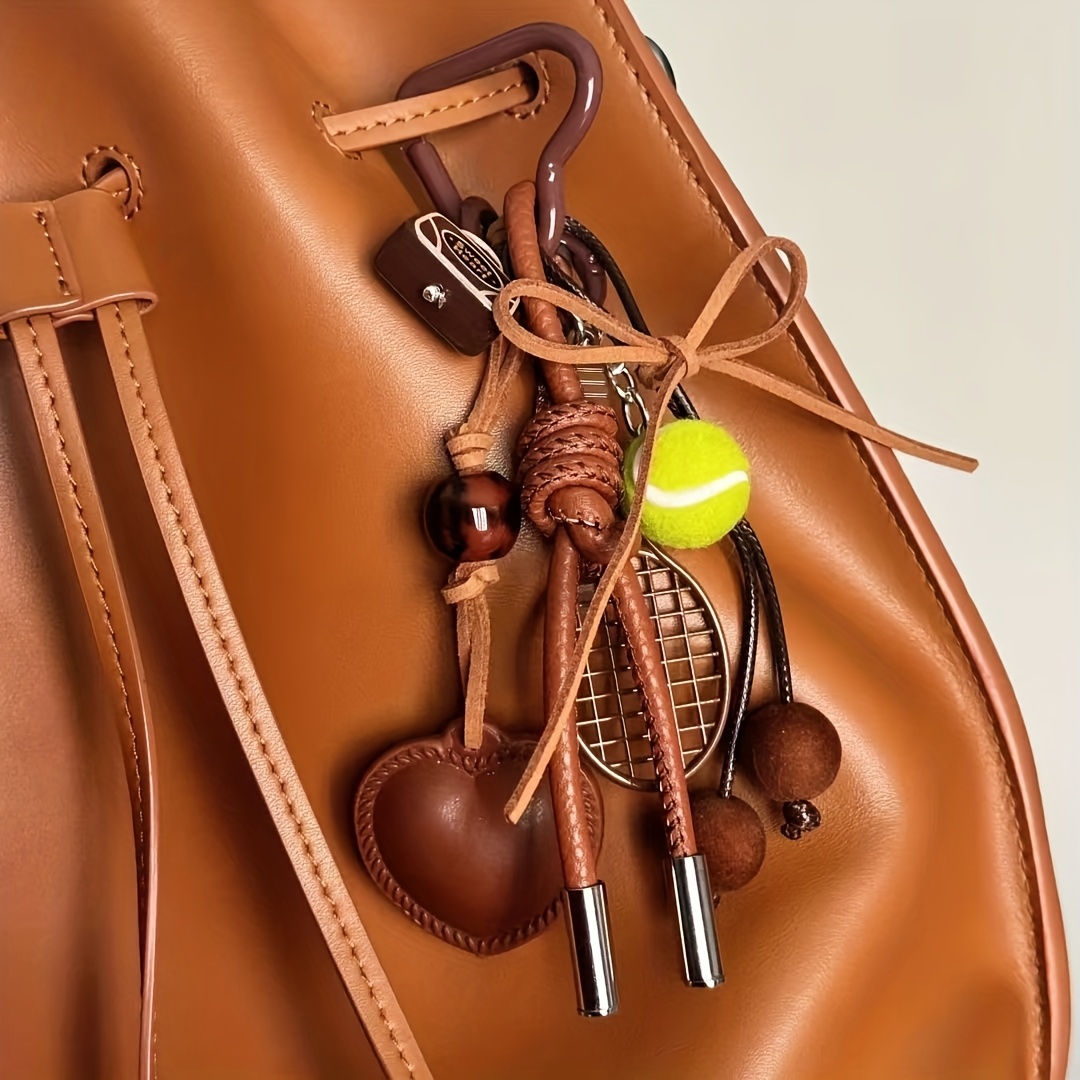 Image of 1pc Tennis Bag Charm Made Of High-quality Leather, Stylish And Sophisticated, Handcrafted In Brown For Autumn And Winter