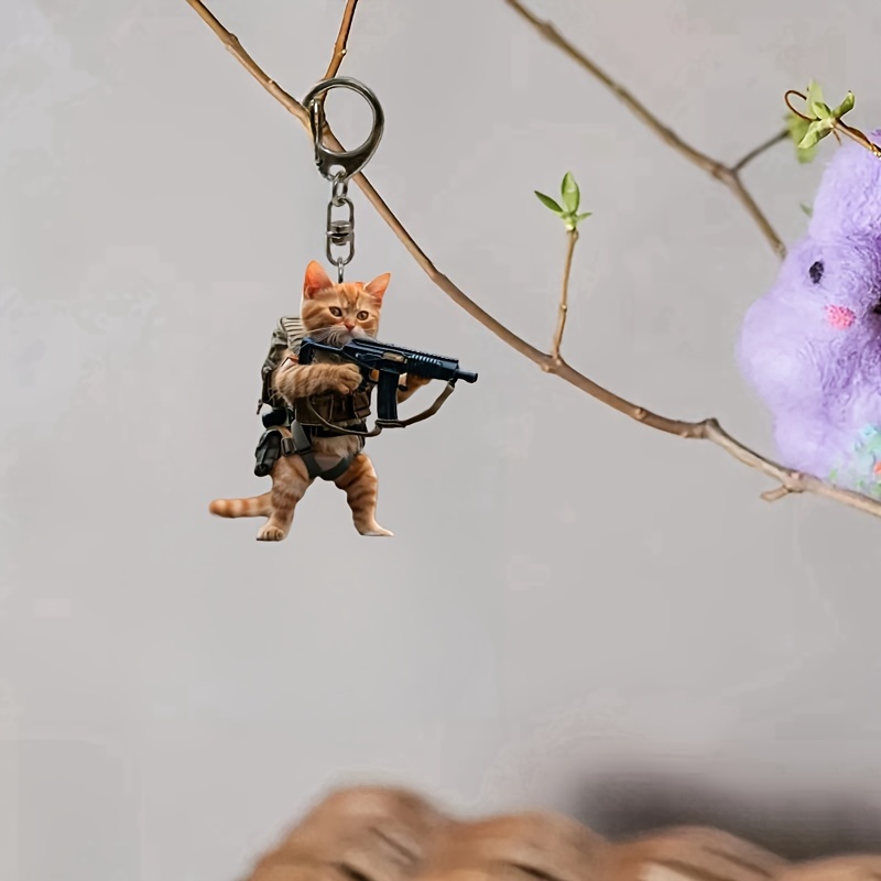 1 шт. акрилова брелок кіт з пістолетом, 2d мультяшний  , простий  , модний аксесуар для автомобілістів, рюкзаків, сумок та святкових подарунків детальніше 2