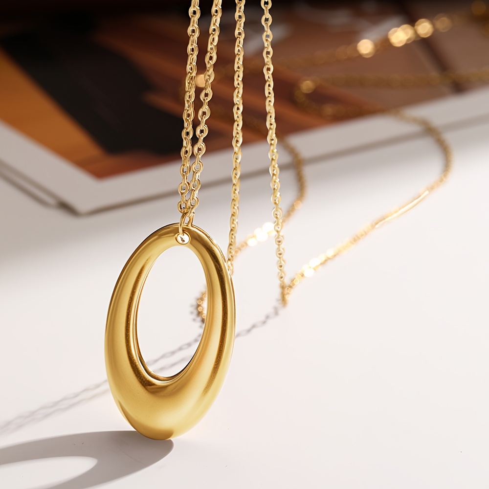 TEMU An Elegant, Simple And Exquisite Necklace With A Hollow-out Curved Geometric Pendant. A Long Water-drop Shaped Necklace Made Of Stainless Steel,