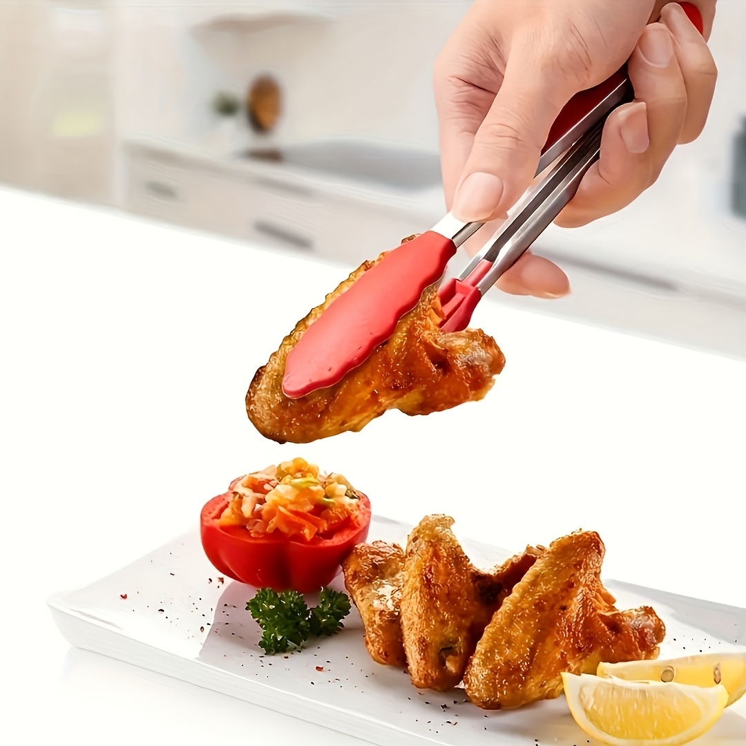 A Stainless Steel Food Tongs for Outdoor Grilling, Perfect for Handling Meat And Steaks, Featuring Heat-Resistant Nylon Grips - Ideal for Barbecues, Buffets, And Outdoor Cooking - Compact And Easy to Carry