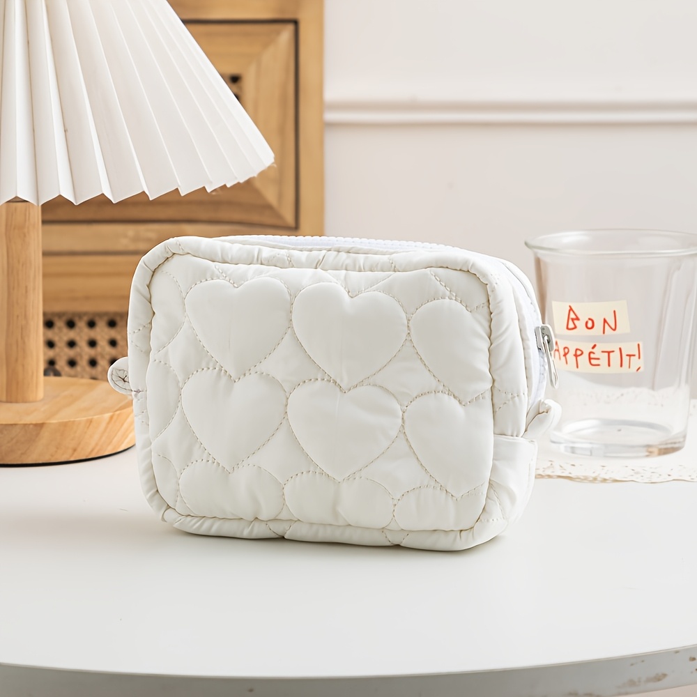 TEMU Esta serie de bolsas de almacenamiento en colores caramelo es un mini bolsa de maquillaje acolchada portátil con forma de , para guardar varios