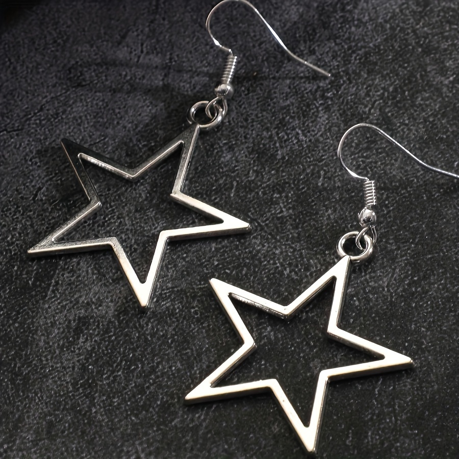 Image of A Pair Of Star-shaped Hollow Pendant Earrings, Featuring A Y2k Vintage , Geometric Star-shaped Jewelry, Perfect As A Gift For Women During Eid