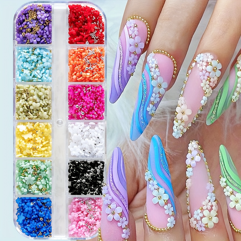 

12-grid Five- Flower Nail Art Accessories With Sizes Of Resin Flowers And Golden And Silvery Beads.