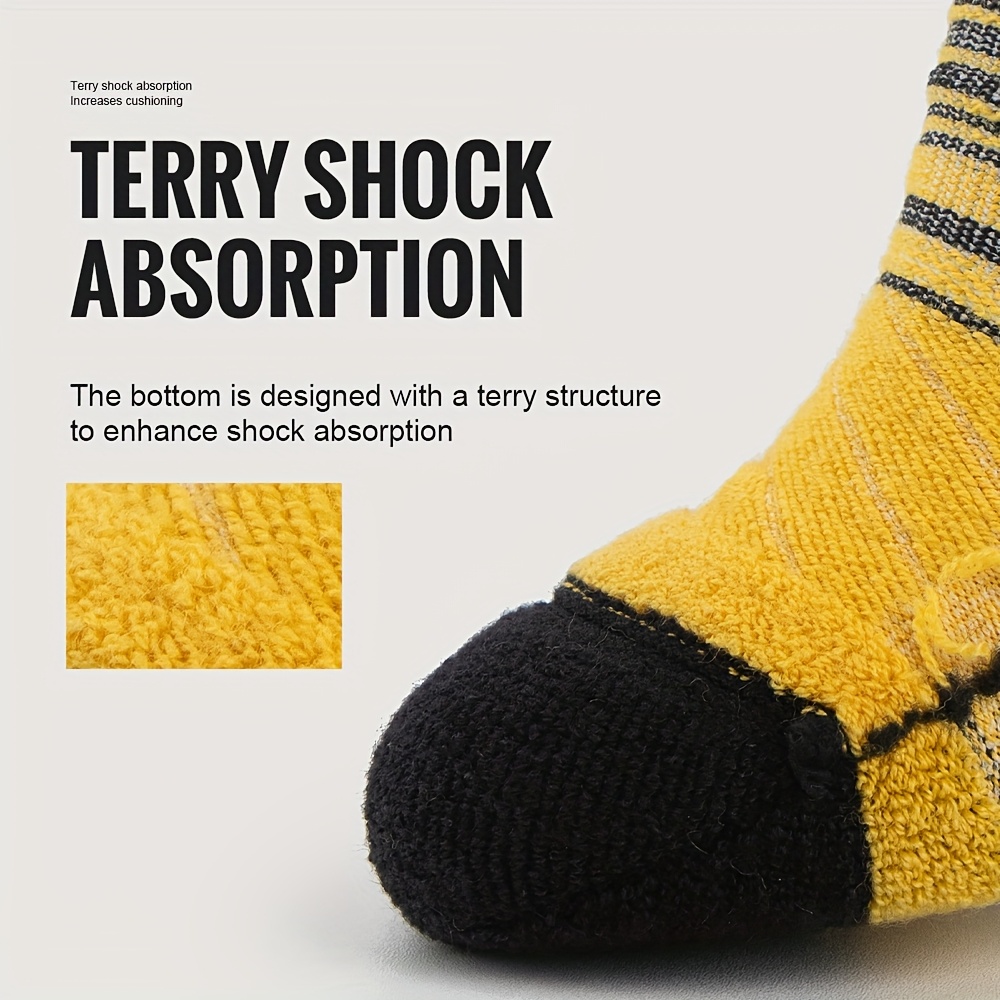 a set of   merino wool athletic socks designed to   and breathable for year round use featuring a full terry   for shock absorption making them ideal for outdoor activities like cycling running basketball and football Product details 4